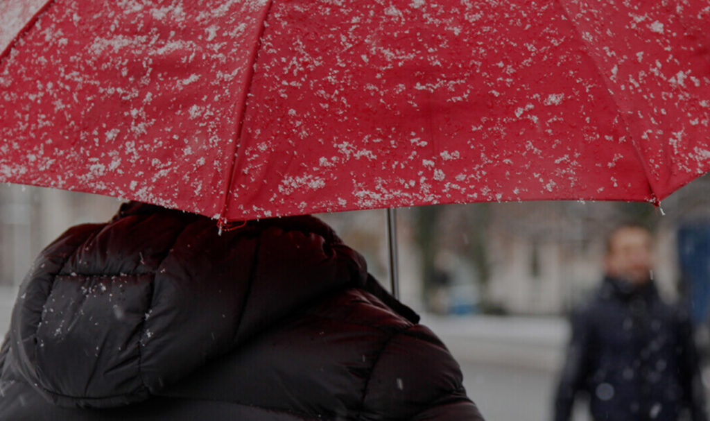 picture of person with umbrella in the rain