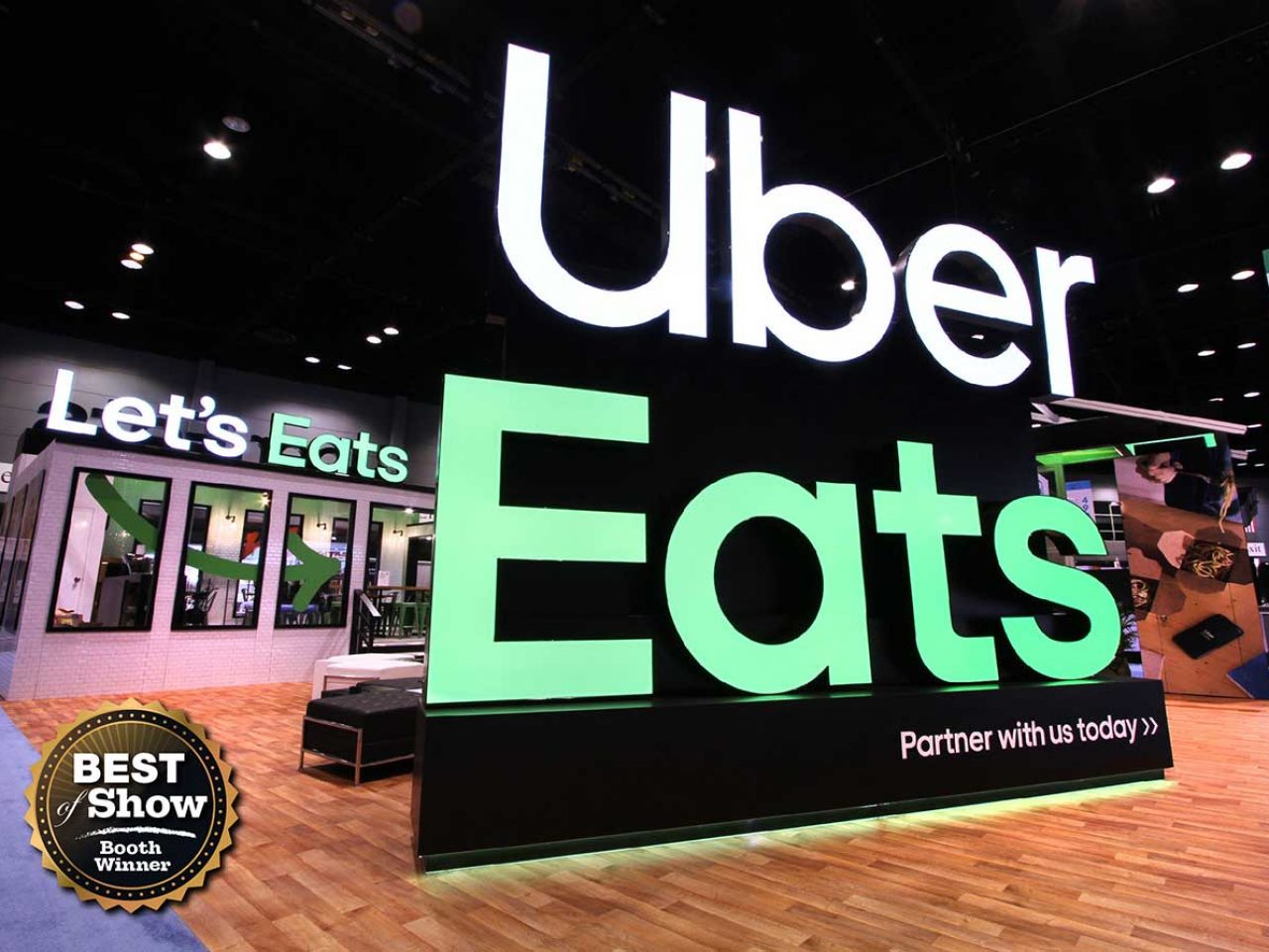 Close-Up of the Uber Eats Sign at the National Restaurant Show
